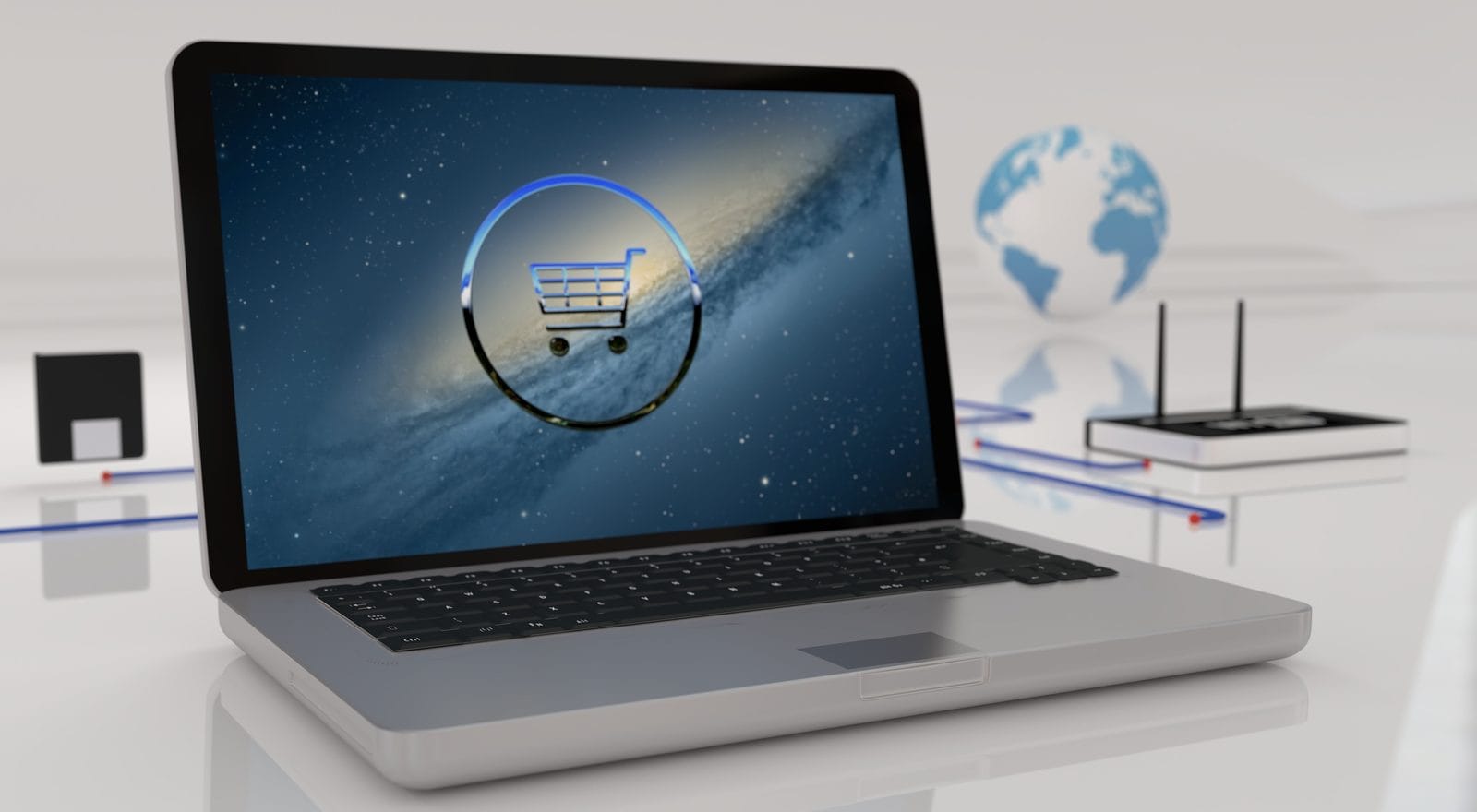 Laptop ekranında alışveriş sepeti ve e-ticaret ikonları